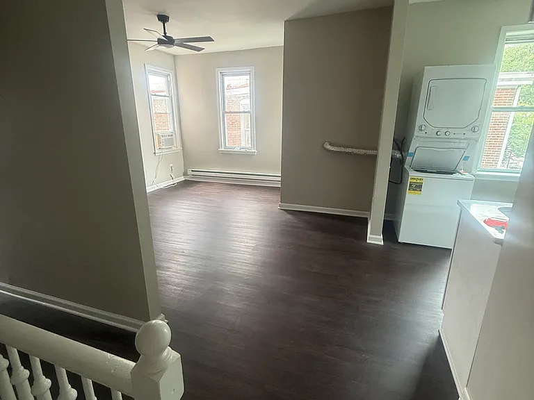 Second Floor Landing Looking into (L to R) Living Room and Kitchen
