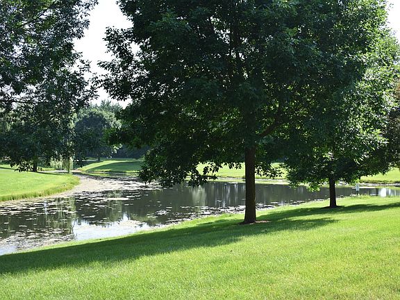 Water view from the front of the home in the court