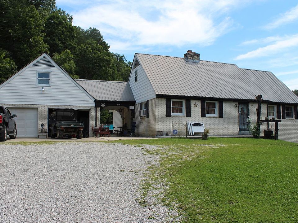 White brick home and garage