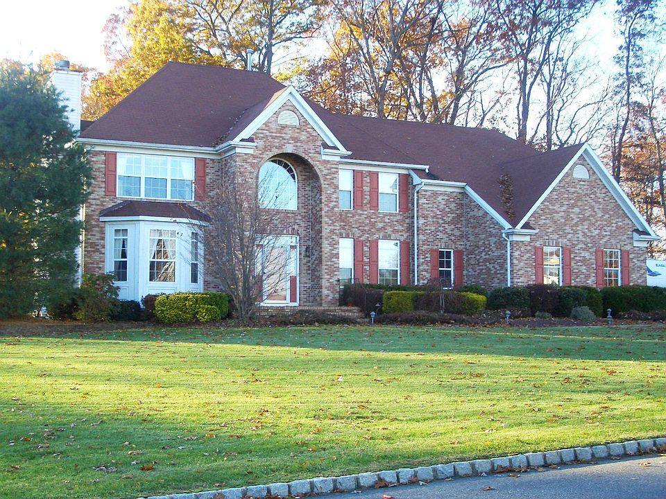 Elegant Brick Front Center Hall Colonial w/ 3 Car Side Entry Garage