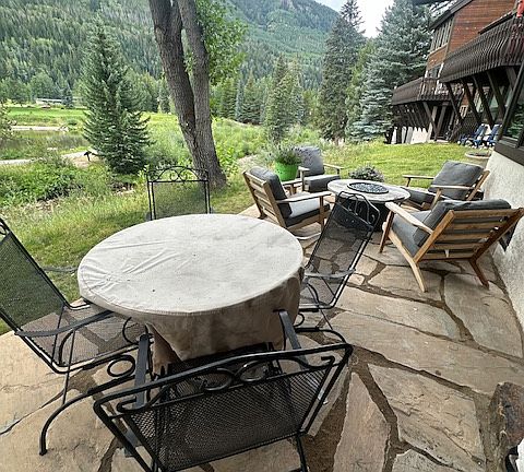 Lower patio accessible from bedrooms. Only table will be out for winter.