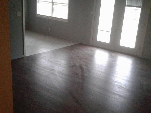 Living room with new wood laminate flooring