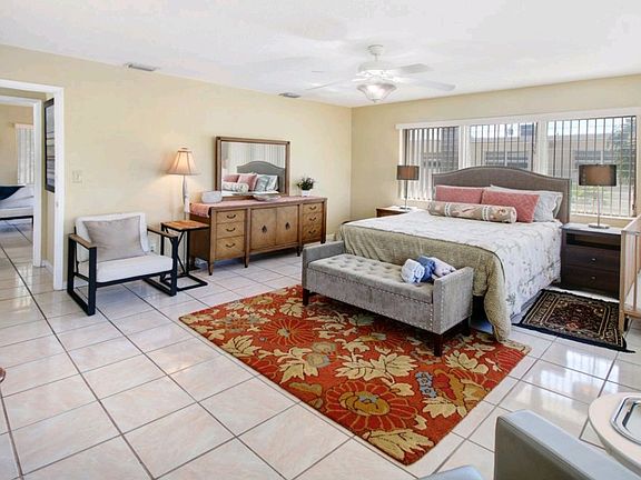 Enjoy very spacious bedrooms with walk in closets and plenty of light.
Complete with beautiful bedding, a crib and reading area