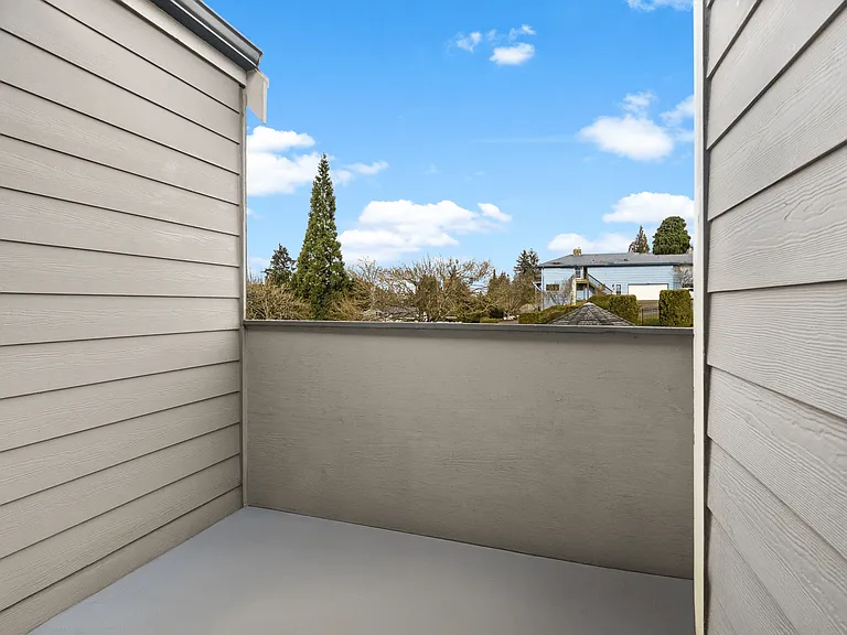 Relax on your private balcony with serene views and fresh air. Relax on your private balcony with serene views and fresh air.