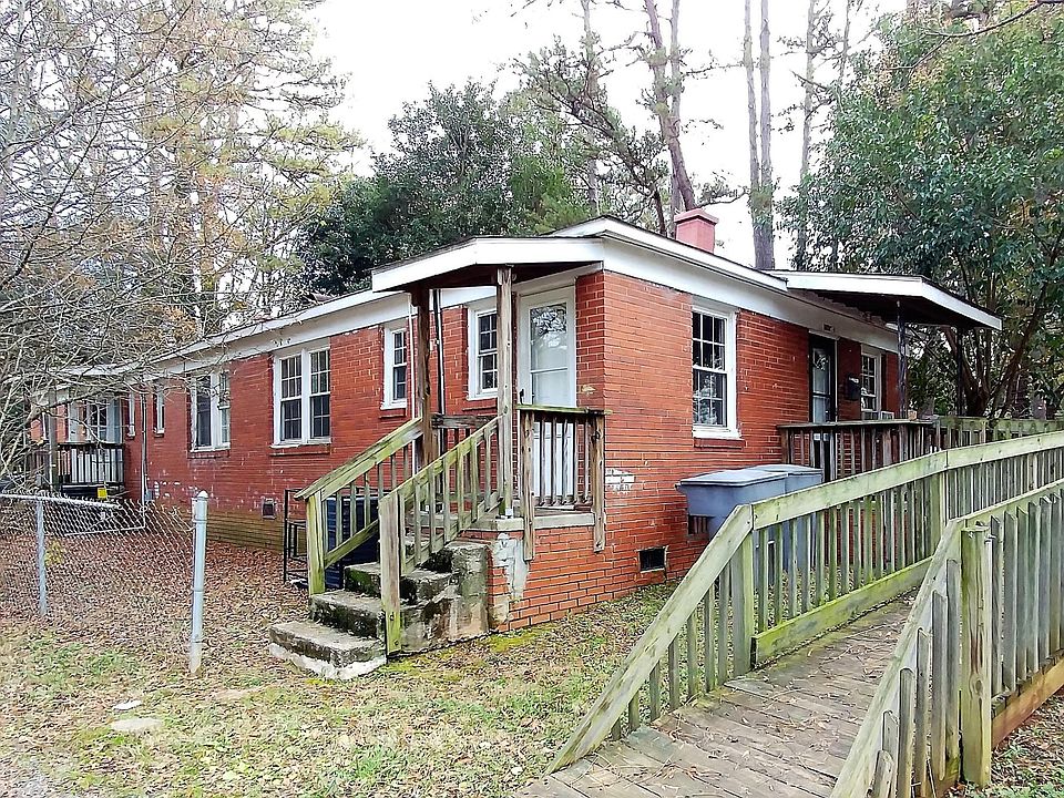 Apartment in triplex - entrance is on left edge of photo