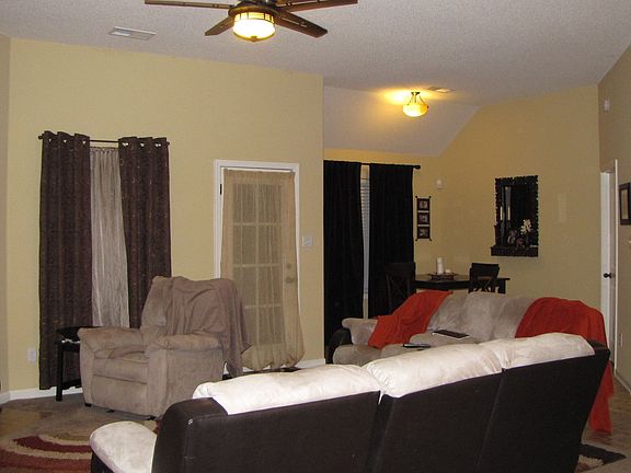 View of the living room and breakfast nook from the foyer