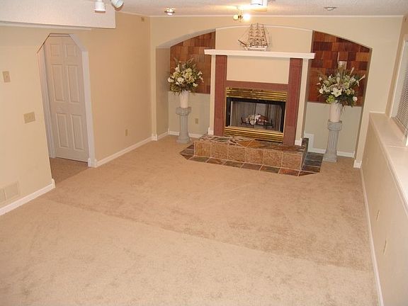 Family room with fireplace in lower level