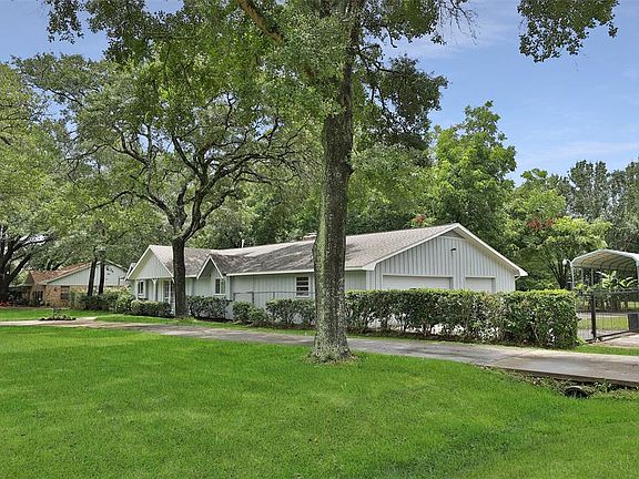 3 car garage is secure behind an electric gate