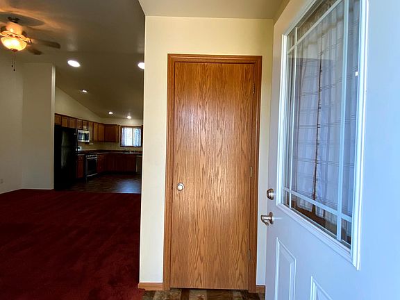 Entry with Coat Closet. Laundry & Garage Access behind the door.
