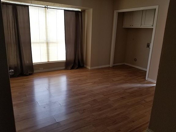 Dining room with laundry space