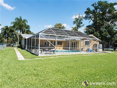 Full fenced view of yard
