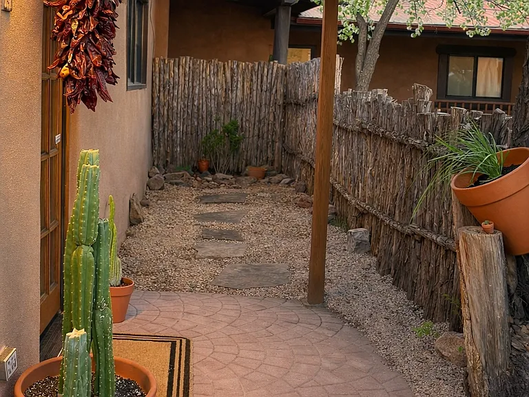 Classic Santa Fe Adobe with private entry and dedicated parking.