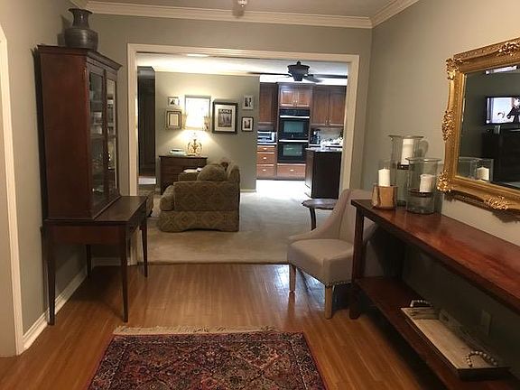 Foyer looking into living and kitchen