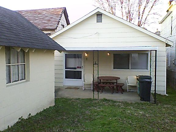 Back including storage building