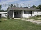 2 Bedroom Ranch home located on a large corner lot. Property has chain-link