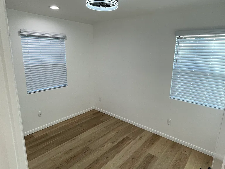 Cozy bedroom #1 with natural light and clean finishes.