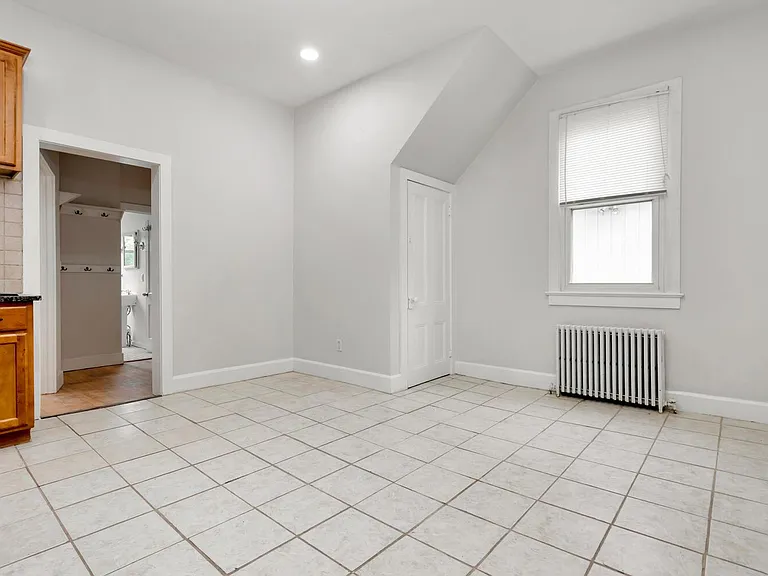 Kitchen has Big pantry area with sitting.