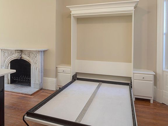 Custom Murphy Bed folds away when not in use.