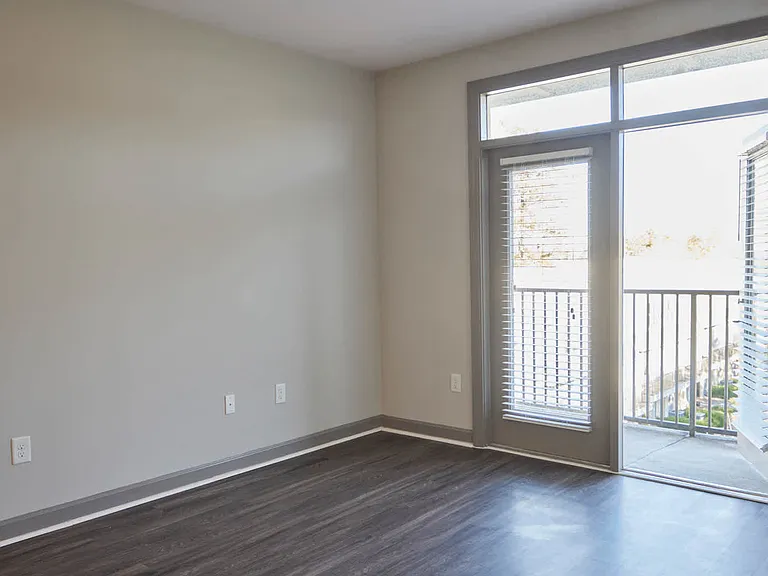 Living Room with Balcony and Hard Surface Flooring