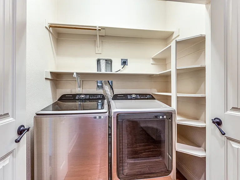 2712 Merida | Duplex a few blocks from TCU | Laundry area includes full size washer and dryer.