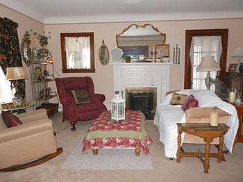 Woodburning fireplace in large living room