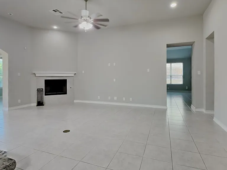 Spacious living room with neut