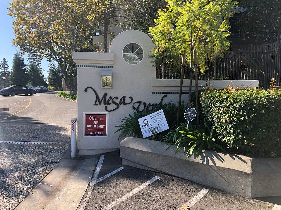 Located in the gated Mesa Verde community