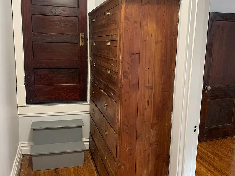 TO ATTIC AND FRONT BED ROOM CLOSET WITH BUILT IN CEDAR STORAGE