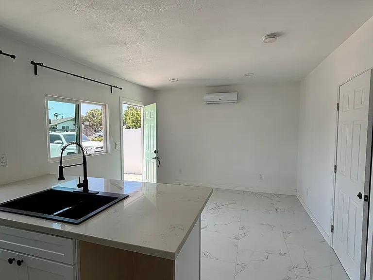 Living room and kitchen sink