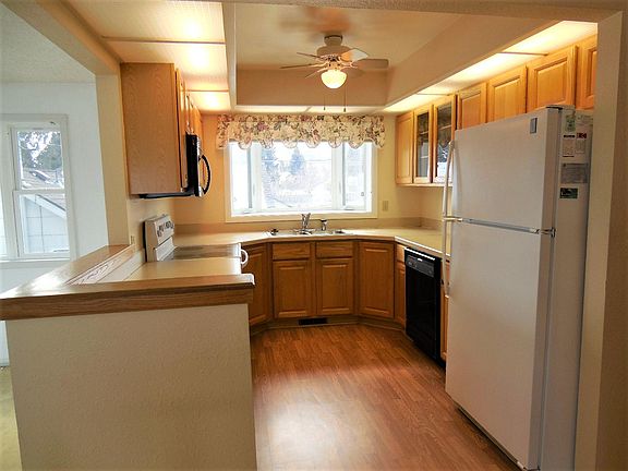 This kitchen opens up onto the living room, perfect for ente