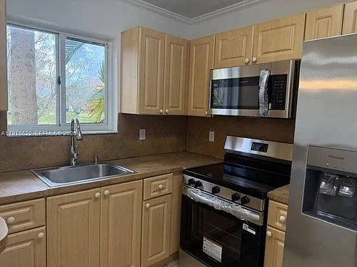 2199 NW 77th Way #104 Photo 1
