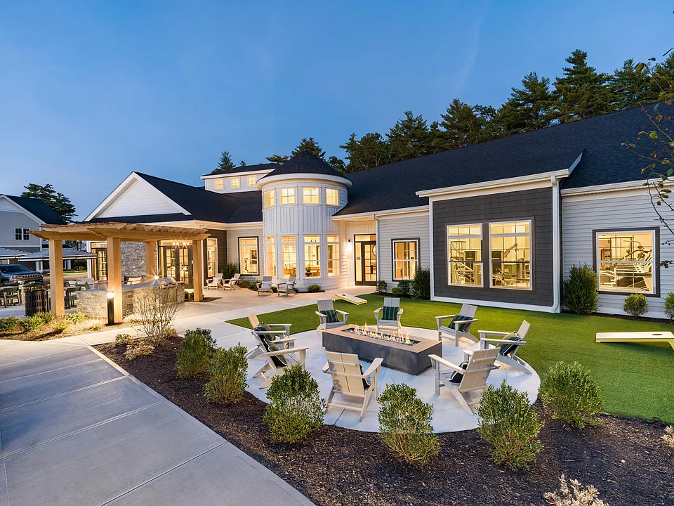 Evenings glow a little brighter with fireside seating, outdoor games, and inviting spaces at Modera South Shore.
