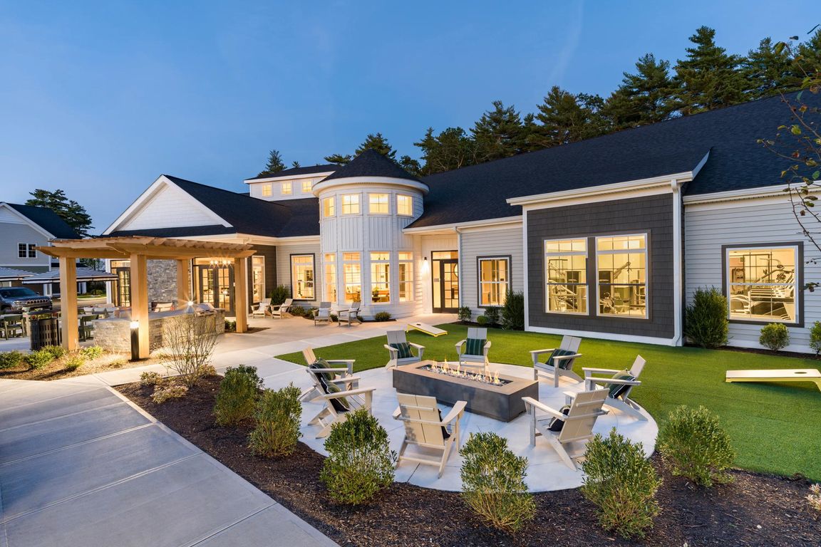 Evenings glow a little brighter with fireside seating, outdoor games, and inviting spaces at Modera South Shore.