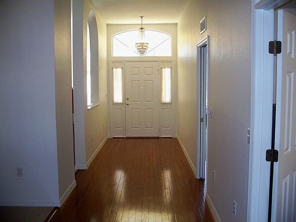 Inviting Foyer w/Hardwood Floors