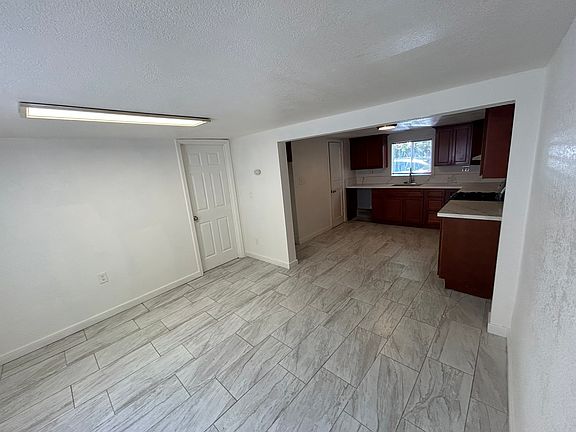 Front Door to Kitchen/Bedroom Door.