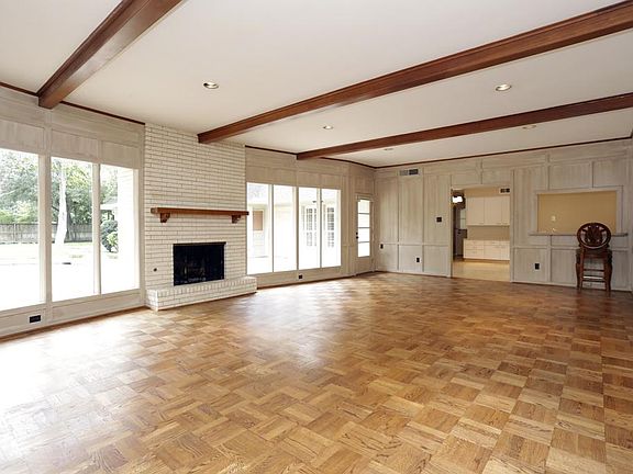 Another view of the DEN. The wet bar with a built-in wine cooler is on the right, next to the breakfast area.