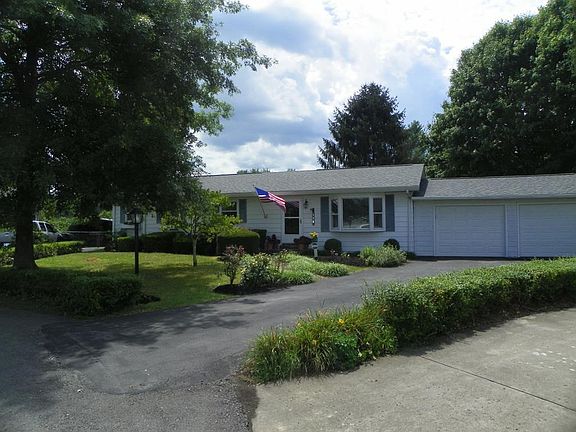 Driveway into the 2 Car Attached Garage