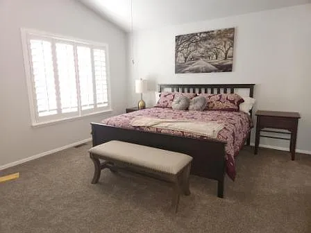 Main bedroom with, king bed and 5 piece adjoining bathroom with huge tub and walk in closet.