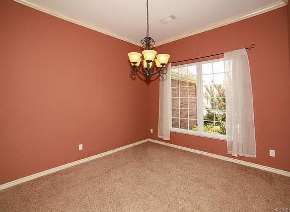 Formal dining to the right of the entry.