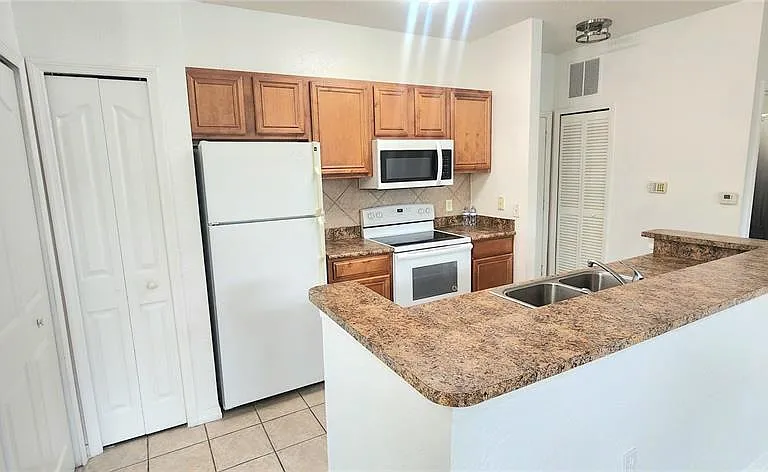 6171 Metrowest Blvd #107 — Photo 13