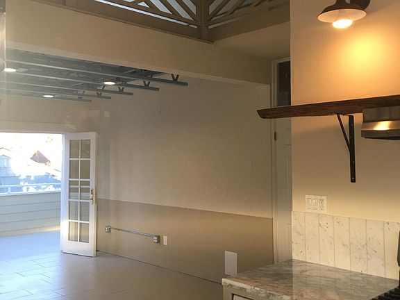 Looking to the balcony from the kitchen