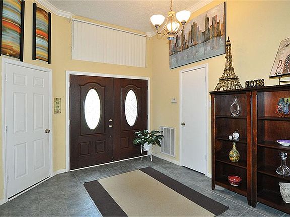 Dramatic front entry overlooks the living room