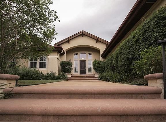 Luscious landscaping adorns the entire property!