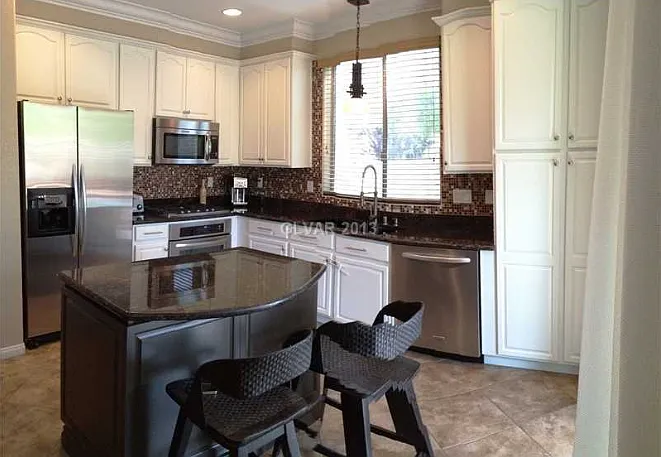 Kitchen - Kitchen Aid stainless steel appliances and granite slab