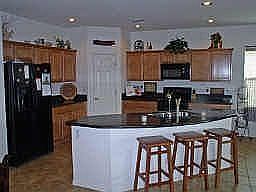 Upgraded granite counters and maple cabinets