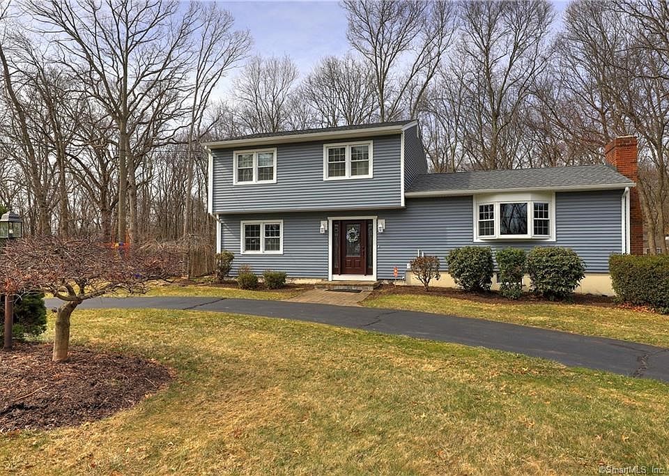 Very well maintained colonial style home with new roof & siding!
