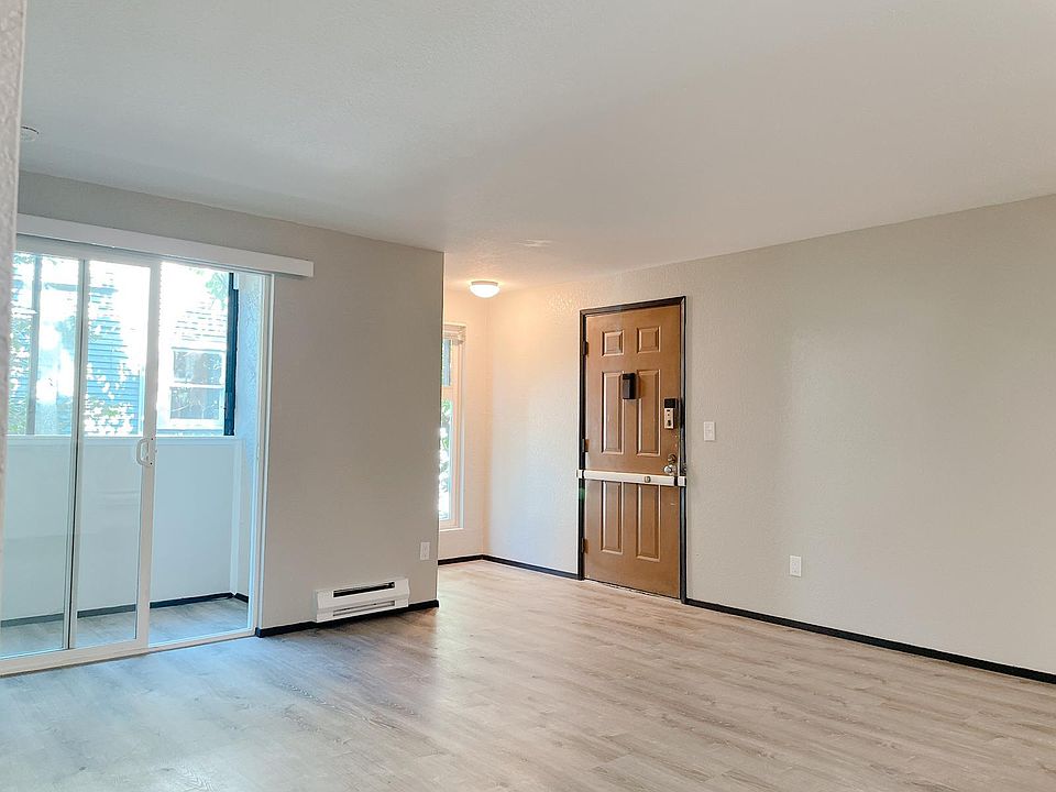 Living room, covered sunroom/patio