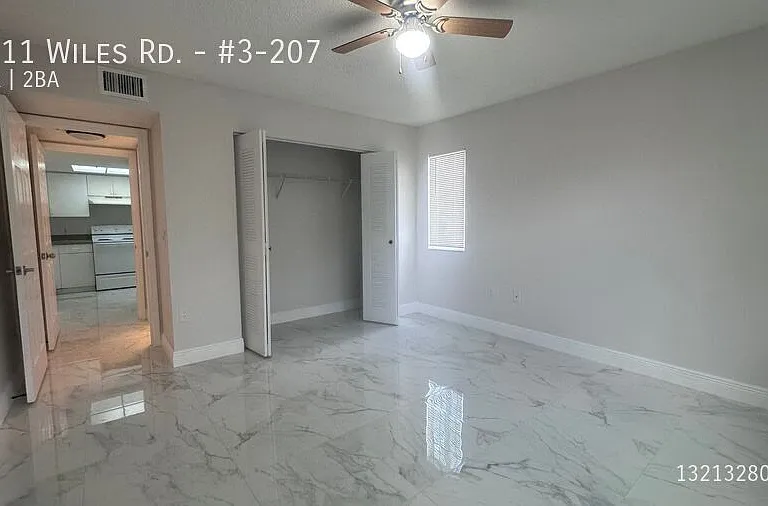 5011 Wiles Rd #3-207 — Photo 39