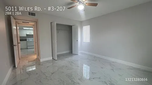 5011 Wiles Rd Photo 1