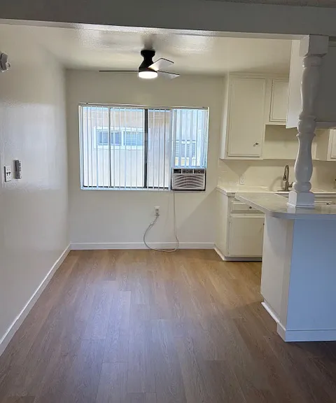 Separate dining area and also a bar top and a new A/C and remove control fan.